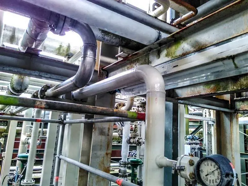 Corroded pipework at offshore Oil and Gas facility coated with NanoPrep and PPG PSX 700