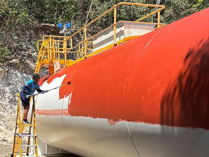 Fuel tank being coated with NanoPrep by roller
