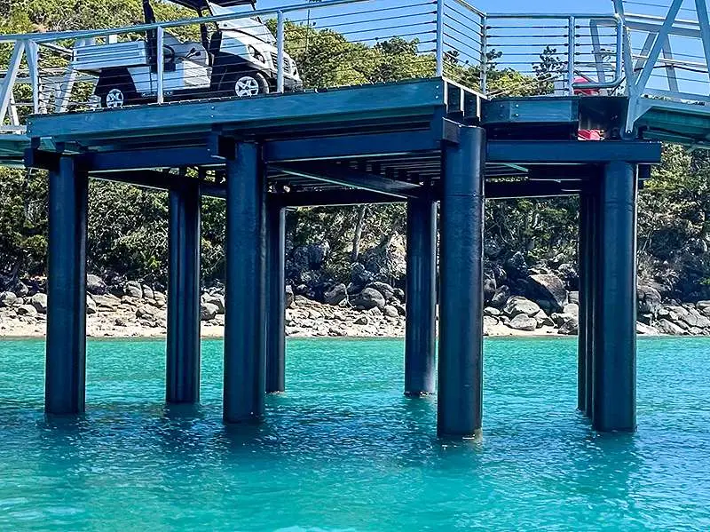 Pier pylons in tidal zone after corrosion protection work